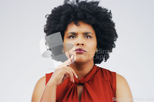 Image of Thinking, frown and woman in studio with anxiety, decision and choice on grey background space. Doubt, suspicious and African female person with worry, stress or fear, contemplating or confused emoji