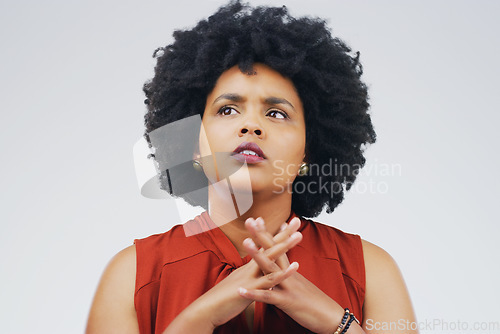 Image of Anxiety, thinking and woman in studio with frown, decision and choice on grey background space. Confused, suspicious and African female person with worry, stress or fear, contemplating or doubt