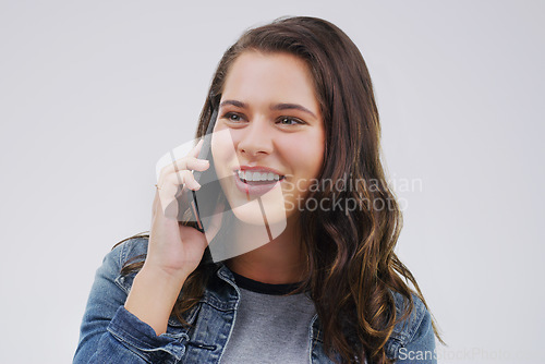 Image of Smile, phone call and woman talking in studio isolated on a white background. Happy, cellphone and female person speaking, discussion or communication, conversation and networking with mobile contact