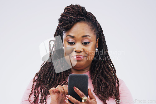 Image of Communication, online and face of black woman with phone in studio for social media, internet and chat. Mockup, white background and female person on smartphone for website, mobile app and texting