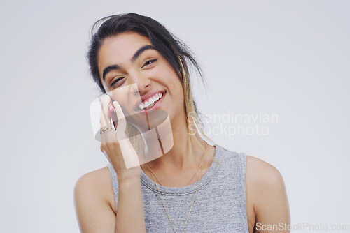 Image of Phone call, funny or portrait of woman talking in studio isolated on white background. Cellphone, laughing or face of female person in communication, speaking or discussion with comedy or comic joke