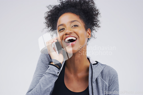 Image of Phone call, funny and black woman speaking in studio isolated on a white background with mockup. Cellphone, laughing and African female person in communication, happy conversation and comic comedy.