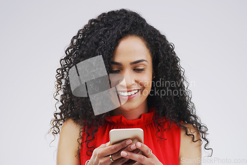 Image of Social media, mockup and woman with a phone, typing and happiness against white studio background. Female person, girl and model with a smartphone, mobile app and contact with network and internet