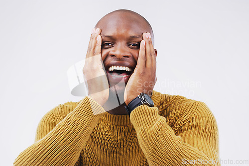 Image of Excited, surprise and portrait of a man in studio with a winning, wow or omg facial expression. Happy, smile and face of African male model with shock to celebrate an achievement by white background.