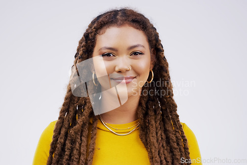 Image of Portrait, happy and braids with a black woman in studio on a gray background for beauty or fashion. Face, smile and style with an attractive young female person feeling confident in trendy clothes