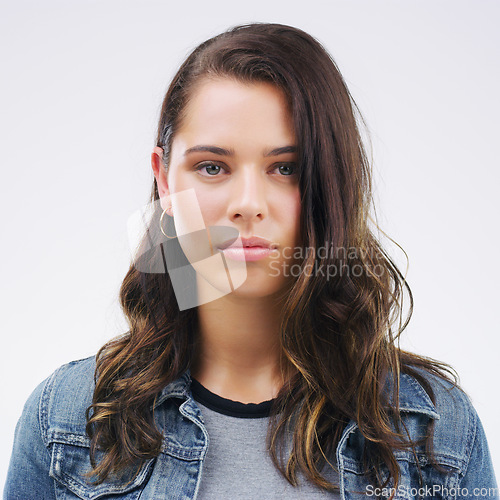 Image of Face, serious portrait and a woman in studio with healthy skin, natural beauty and cosmetics. Headshot of a young female model with a facial expression isolated on a white background from Canada