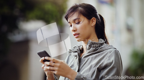 Image of Woman, smartphone and social media in the city with communication and technology outdoor. Female person online in urban street, connectivity and chat on mobile app with mockup space and texting