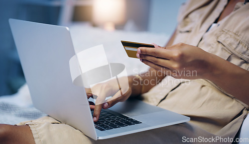 Image of Credit card, woman hand and night in a bed with online shopping and computer with purchase. Bedroom, internet store and ecommerce deal of a female person in a home trying to pay on a web laptop app