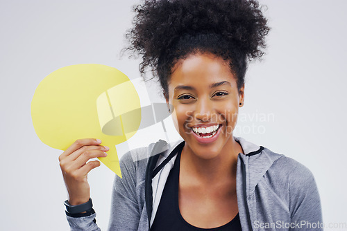 Image of Happy black woman, portrait smile and speech bubble for social media, question or FAQ against a white studio background. African female person smiling with sign for comment, message or mockup space