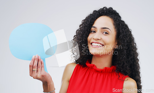 Image of Happy woman, portrait and face with speech bubble for social media, FAQ or question on a white studio background. Female person smiling with shape, symbol or sign for comment, message or mockup space