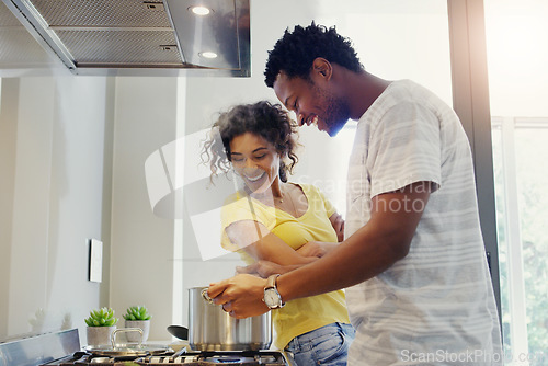 Image of Cooking, love and food with couple in kitchen for bonding, breakfast and morning. Happiness, smile and health with man and woman preparing meal together at home for relax, nutrition and wellness