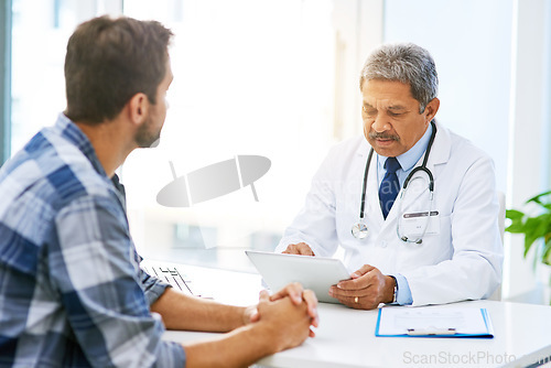 Image of Senior doctor tablet, man patient and results with medical consultation and discussion in clinic. Hospital, talk and health insurance checklist of healthcare and wellness professional talking