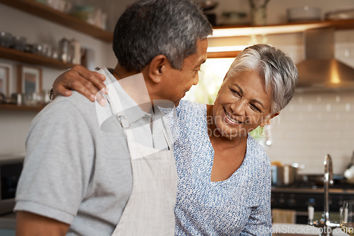 Image of Kitchen, happiness and old man with woman, embrace and healthy marriage bonding in home for dinner. Love, help and cooking, senior couple with smile, hug in apartment and happy time in retirement.