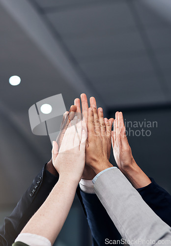 Image of High five, success and hands of business people in office for celebration, team building and motivation. Corporate, collaboration and workers with hand together for agreement, support and team goal