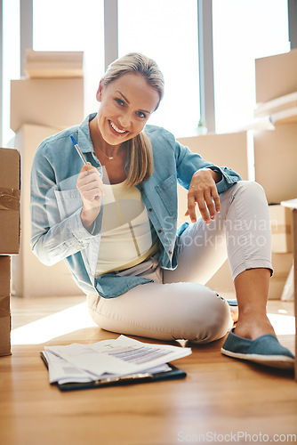 Image of Portrait, woman and paperwork on the floor in apartment for investing and savings in a contract. Boxes, invest and document in living room of a new house with lease for investment and finance.