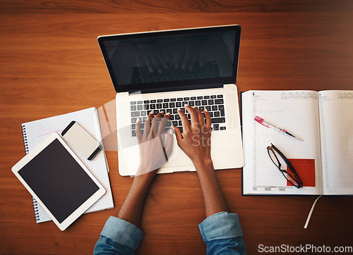 Image of Woman hands, online typing and laptop with education and learning notes at home. Top, female person and computer working with studying, student notebook and writing in a house doing web research