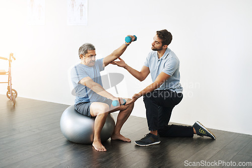 Image of Weights, physiotherapy and help with doctor and old man for rehabilitation, training or stretching. Healthcare, wellness and healing with patient and physiotherapist for consulting, muscle or balance