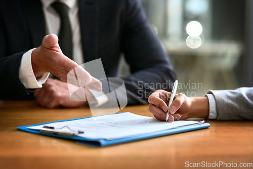 Image of Business people, hands and contract or signature for deal, partnership and legal paperwork, law firm and night office. Paper, client advice and lawyer person, notary or partner writing and agreement