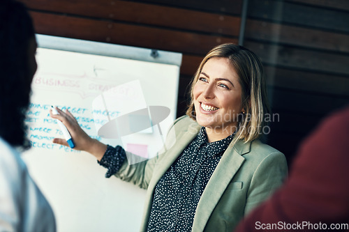 Image of Presentation whiteboard, audience and happy woman planning, coaching and present strategy, ideas or office plan. Sales workshop, project management and team leader, boss or person speaking to group