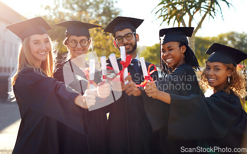 Image of Group, graduation and students with a diploma of college or university friends with pride. Diversity men and women outdoor to celebrate education achievement, success and certificate at school event