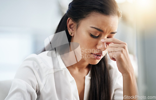 Image of Business, burnout or woman with headache, stress or tired in office with fatigue, anxiety or depression. Depressed employee, sad female consultant or person frustrated with migraine pain in workplace