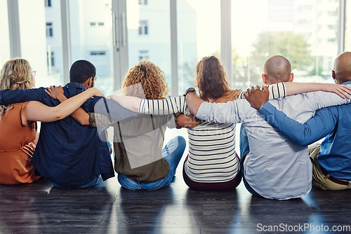 Image of Support, group and hug with back of people for teamwork, community and diversity. Solidarity, faith and collaboration with group of friends for trust, gratitude and kindness together