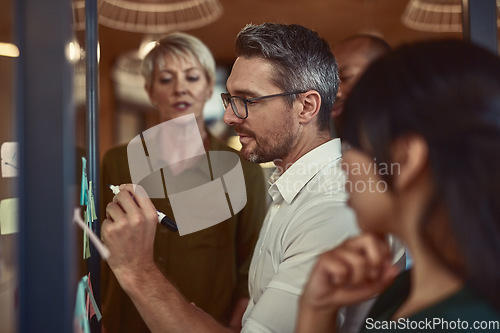 Image of Businessman, team and writing in planning schedule for brainstorming, collaboration or strategy meeting at office. Man employee in leadership, presentation or training staff in teamwork for project