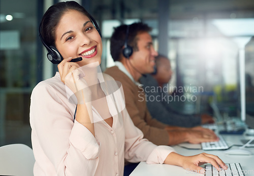 Image of Call center, woman smile and portrait with contact us, crm and customer service job. Phone help, sale and web advice employee with happiness from telemarketing and internet work on office desk