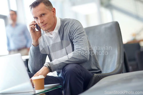 Image of Phone call, travel and business man in airport on laptop for conversation, discussion and planning. Corporate, trip and portrait of manager on smartphone for networking, b2b communication and meeting