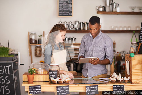 Image of Tablet, restaurant and owner in teamwork of people, discussion and manage orders in store. Waiters, black man and happy woman in cafe with technology for inventory, stock check and managing sales.