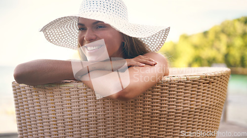 Image of Summer, fashion and woman relax with hat for holiday, vacation and weekend getaway outdoors. Traveling, tropical resort and female person with smile for luxury tourism, sunshine and happy at poolside