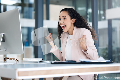 Image of Celebration, good news and businesswoman with a fist pump in the office for success or achievement, Computer, winner and professional female employee with corporate goal to celebrate in the workplace