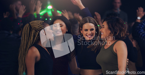 Image of Dance, party and night with women in club for music, celebration and nightlife concert. Festival, disco and rave with friends dancing in crowd at social event for energy, techno and dj show