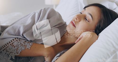 Image of Woman, tired and thinking in bed, home or relax on holiday with vision, memory or ideas in morning. Girl, bedroom and remember with anxiety, mindfulness or fear at hotel, house or vacation in Mexico