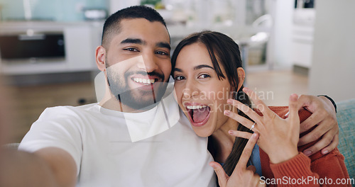 Image of Couple, selfie and engagement ring in home portrait with happiness, romance and love on social media app. Man, woman and profile picture for marriage proposal, offer or celebration with smile on blog