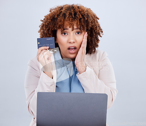 Image of Credit card, laptop and a woman shocked or surprised with online shopping bill, scam or fintech payment. African female person with technology for e commerce mistake, security password or glitch