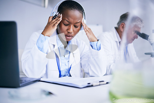 Image of Science, tired and black woman with a headache, research and health issue with burnout, overworked and exhausted. Female person, employee and researcher with a migraine, anxiety and pain with stress