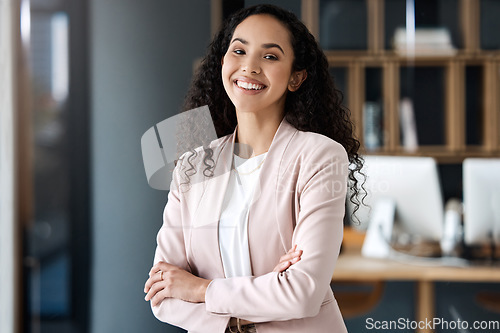 Image of Portrait of happy business woman with arms crossed in legal office with confidence and happiness. Smile, professional female lawyer and boss at law firm, young corporate workplace manager in Brazil.