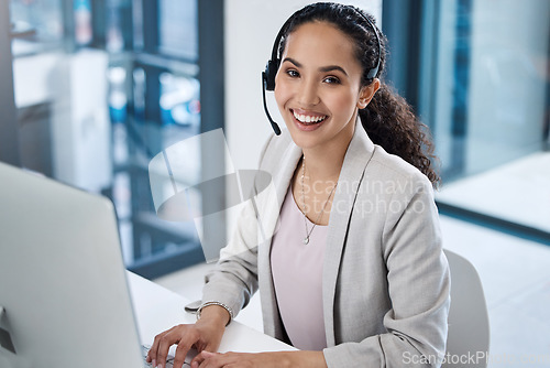 Image of Call center woman, portrait and computer in office for customer service, tech support and IT advice with voip. Crm, telemarketing or agent with headset, microphone and consulting with pc at help desk