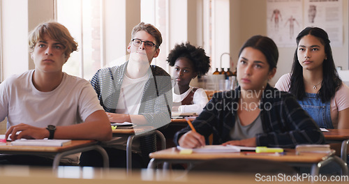 Image of Education, college and students sitting in a classroom for learning, studying or future development. School, university and scholarship with a group of pupils in class lecture together to learn