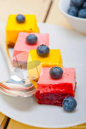 Image of strawberry and mango mousse dessert cake