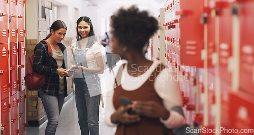 Image of School bully and a girl with a phone for a secret, gossip or rude message online. Sad, anxiety and an African student on a mobile app with group whisper from students doing cyber bullying at class