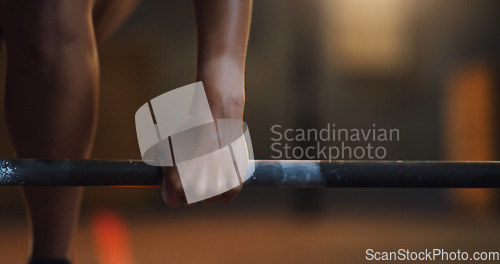 Image of Weightlifting, fitness and hands of person with barbell in gym for training, exercise and intense workout. Sports, strong body and body builder people lift weights for challenge, wellness or strength