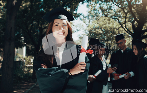 Image of Portrait, education or diploma on graduation, arms crossed or happiness with knowledge, study or scholarship. Face, female person or student with success, degree or college with certificate and event