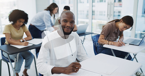 Image of Black man, student portrait and university class with learning for college test. Book, school study and African male person thinking, writing and planning lecture notes for studying with a smile