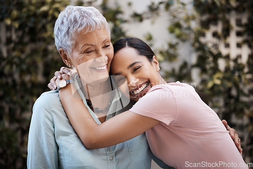 Image of Happy, hug and portrait of a mother and woman in a garden on mothers day with love and gratitude. Smile, family and an adult daughter hugging a senior mom in a backyard or park for happiness