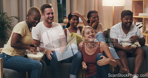 Image of Movie, friends and diversity watch comedy at home for entertainment and relaxing in the lounge. Young, adults and watch funny film together on a couch to relax or have fun on a weekend at the house.