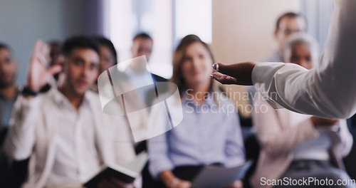 Image of Hand, speaker and woman with a presentation, conference and speech with question, teamwork and corporate training. Female leader, employee and audience listening to manager, workshop and feedback
