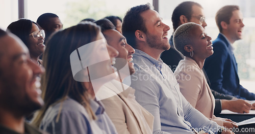 Image of Business people, conference and happy audience laughing at a seminar, workshop or training. Diversity men and women crowd at a presentation for learning, knowledge and funny corporate discussion