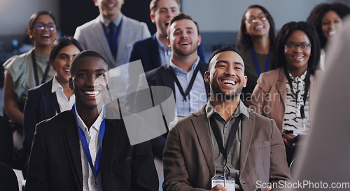 Image of Business people, conference and happy audience laughing at a seminar, workshop or training. Diversity men and women crowd at conference or convention for corporate education, knowledge and learning